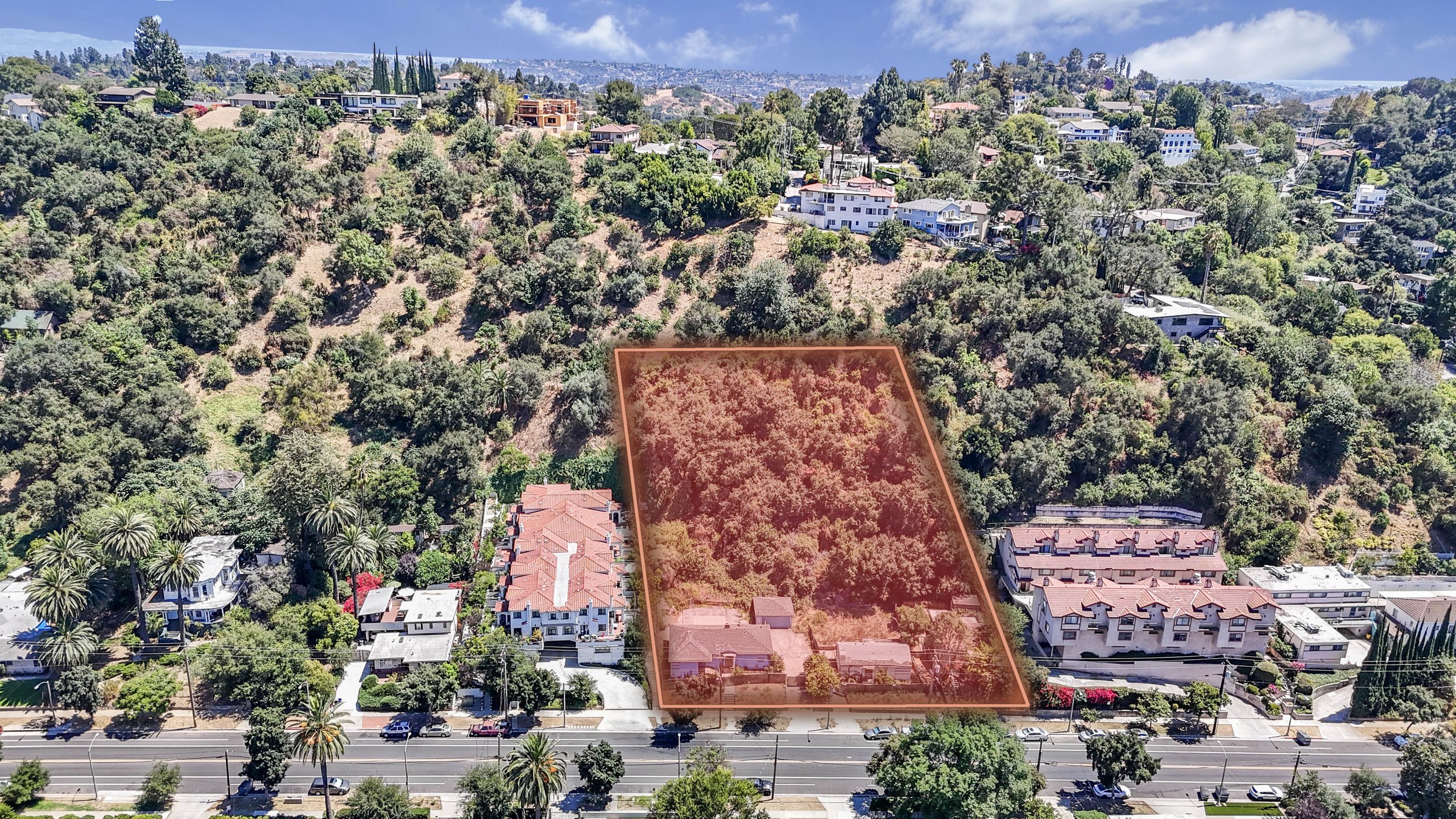 Drone view of the Monterey Road frontage with the site shaded