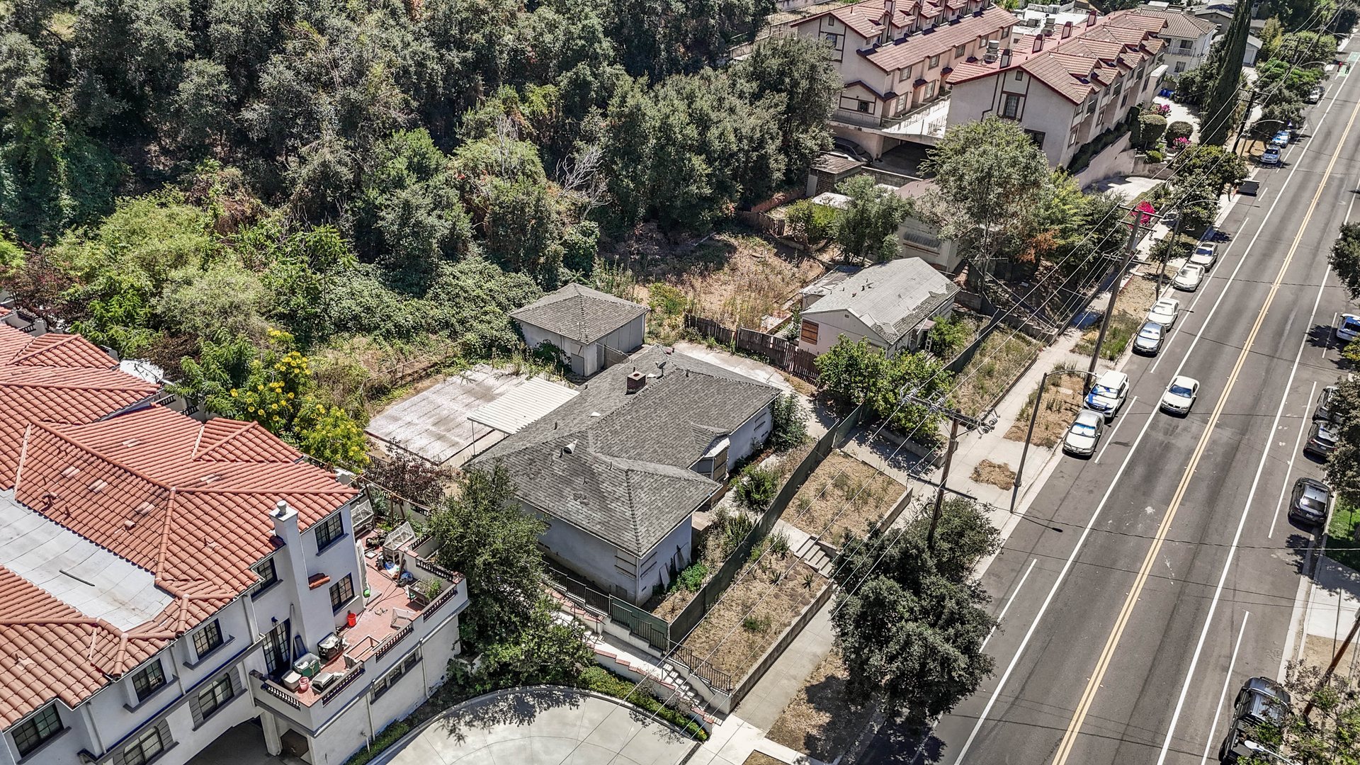 Drone view along the Monterey Road frontage over the existing homes